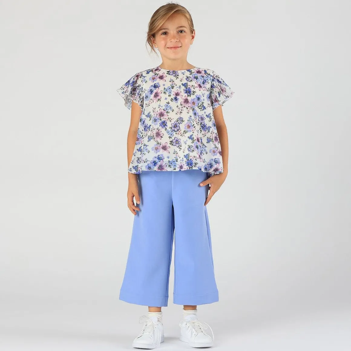Blusa con maniche plissè da bambina