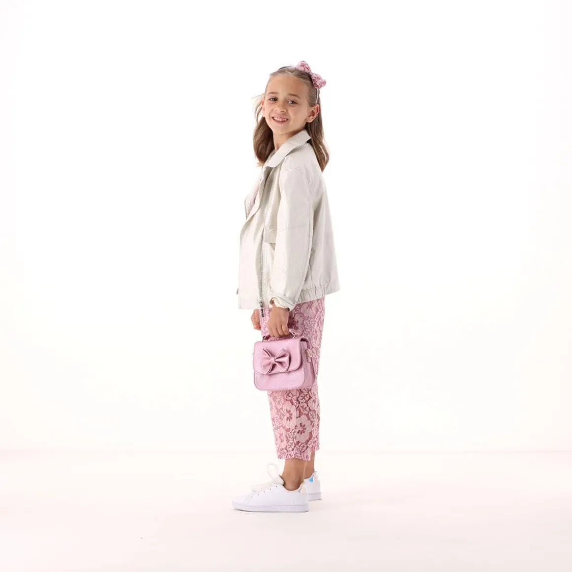 Chiodo in ecopelle con vestibilità over per bambina