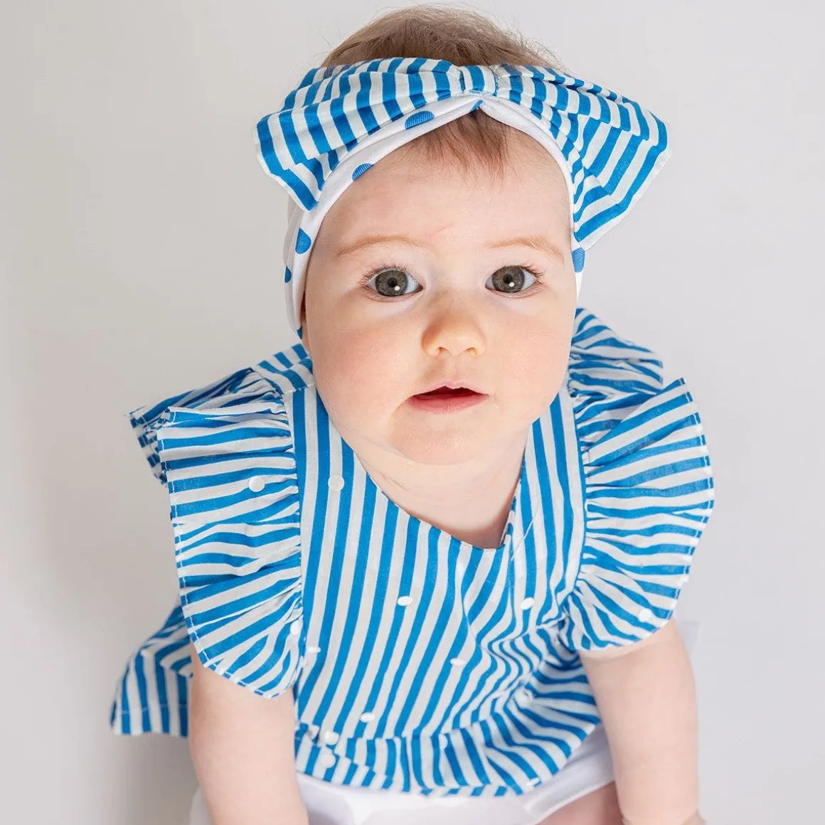 Completo blusa a righe e pantalone corto bambina