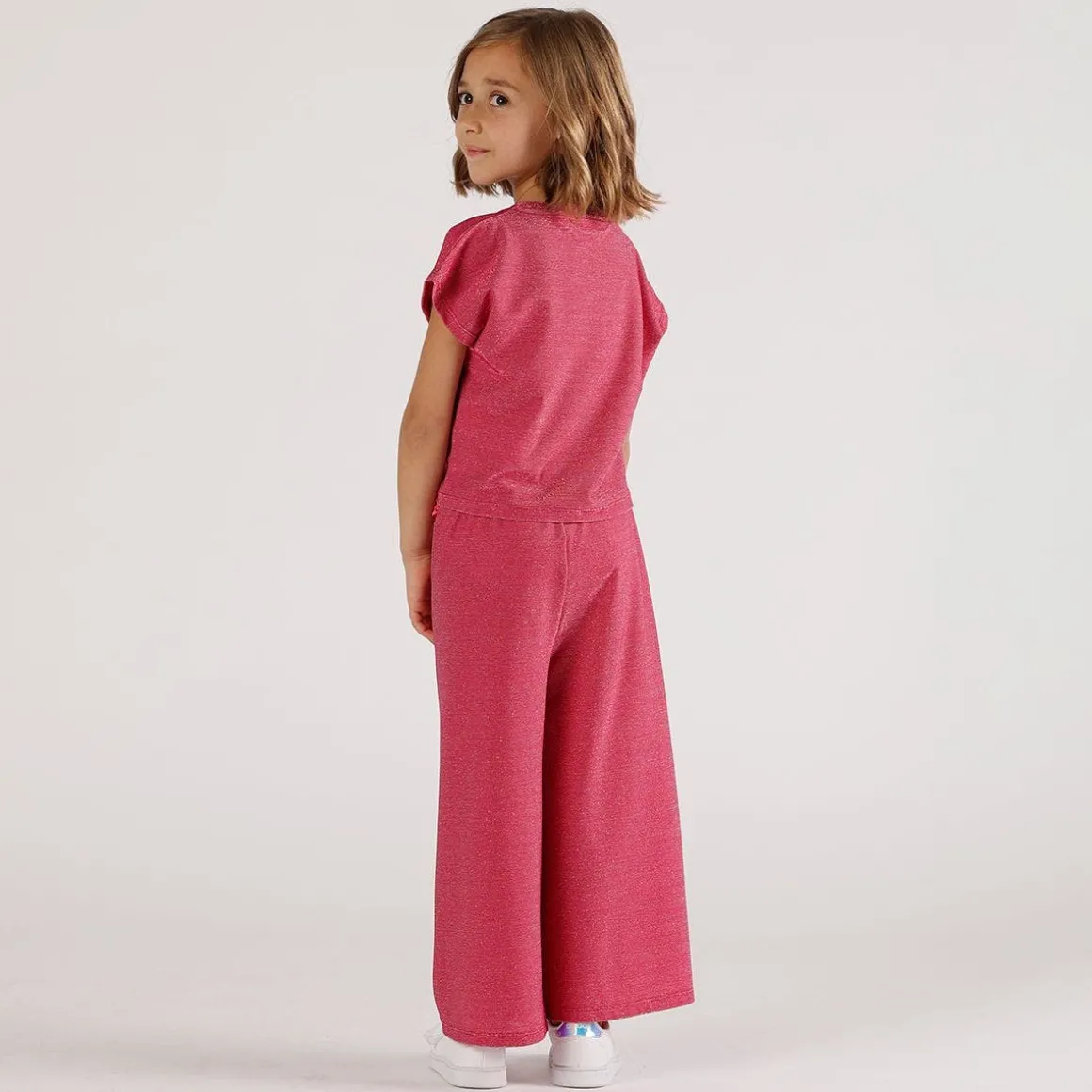Completo elegante in jersey lurex bambina