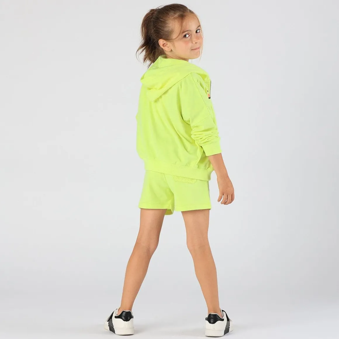 Felpa fluo con zip da bambina