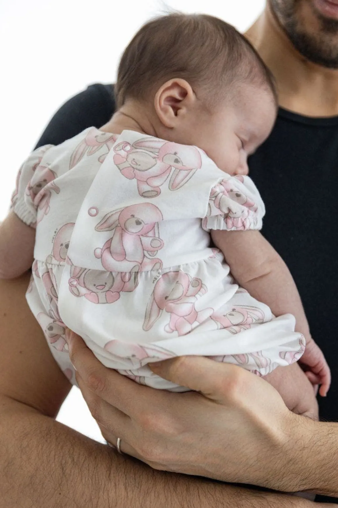 Pagliaccetto con coniglietti per neonata