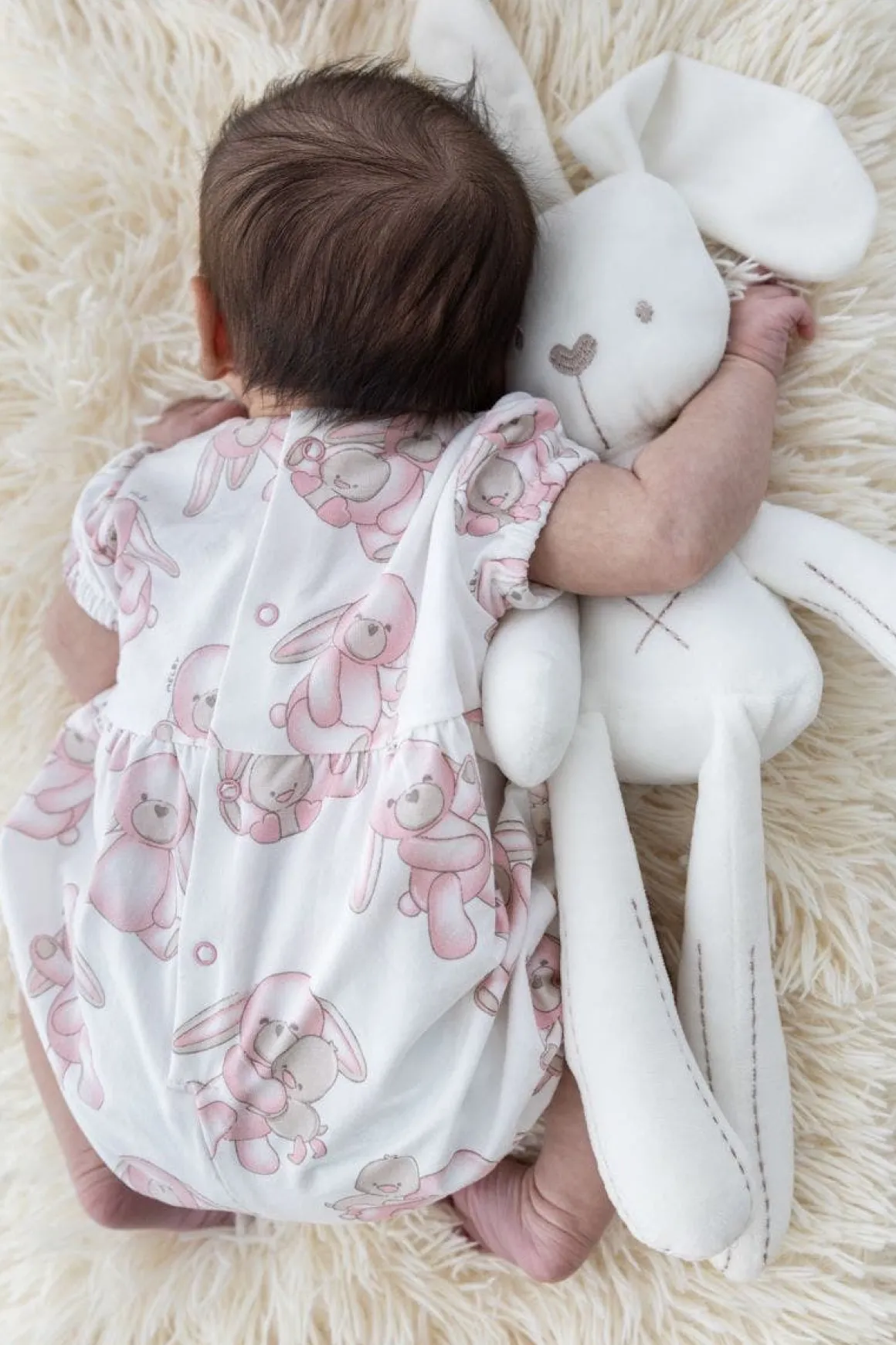 Pagliaccetto con coniglietti per neonata