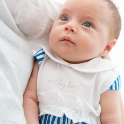 Pagliaccetto in jersey e tela da neonata