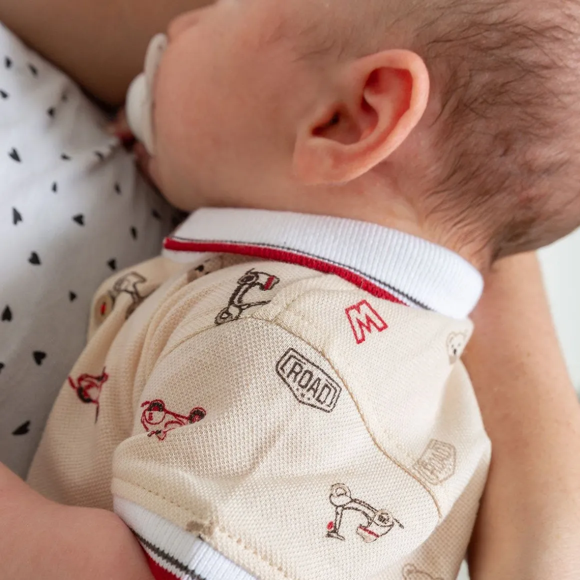 Pagliaccetto in piquet stampato da neonato