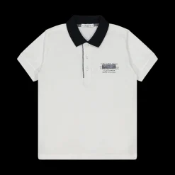 Polo da bambino elegante in piquet bianco.