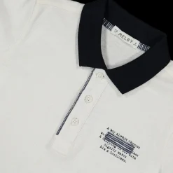 Polo da bambino elegante in piquet bianco.