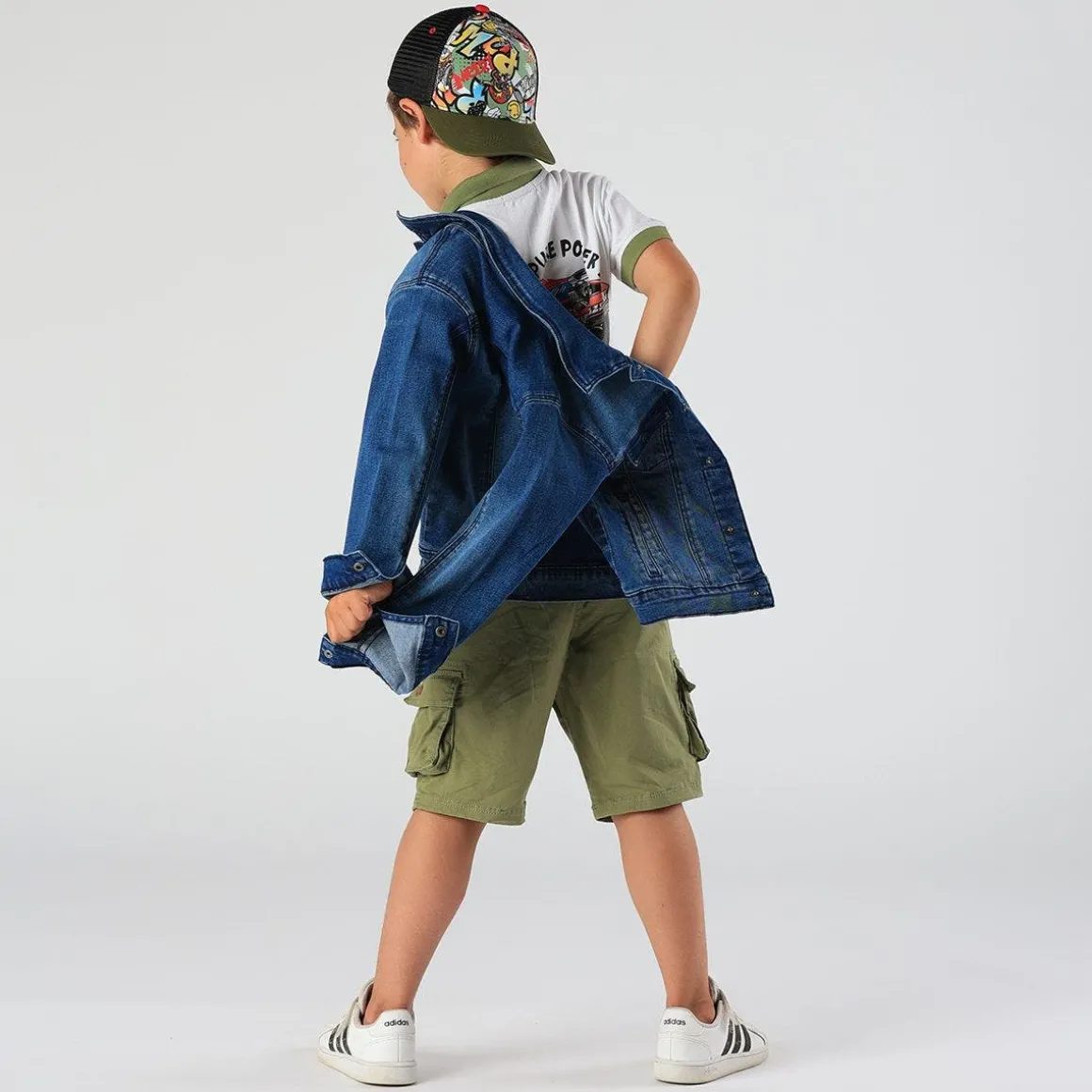 Polo da bambino in piquet con stampa sul retro