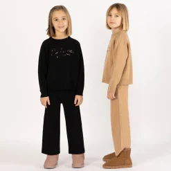 Tuta elegante in tricot per bambina