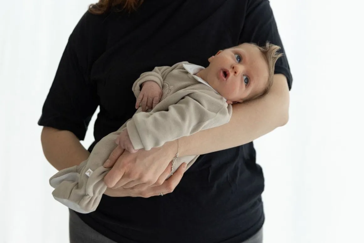 Tutina con orsetto per neonato